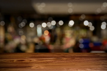 top wood table with Blur Background