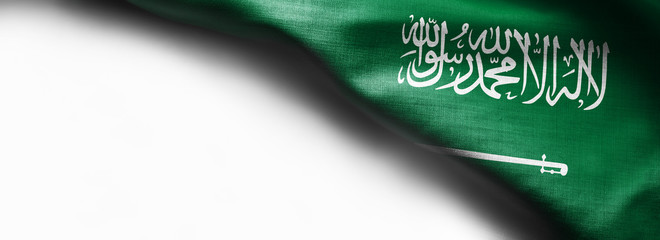 Fabric texture flag of Saudi Arabia on white background