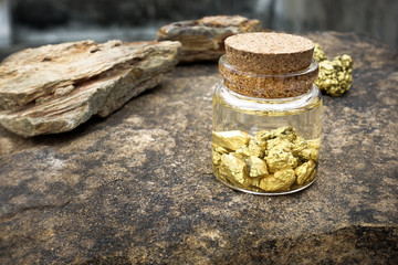 pure gold ore found in mines. Put in a glass bottle of water or mercury on a stone floor