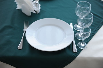 Dinner plate setting in restaurant