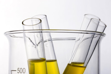 beaker and cylinder closeup isolated white.