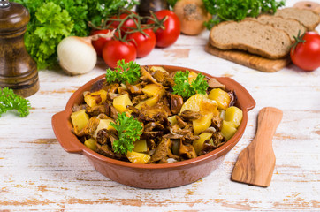 Fried mushrooms with potatoes