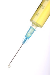 hand hold a syringe isolated white.
