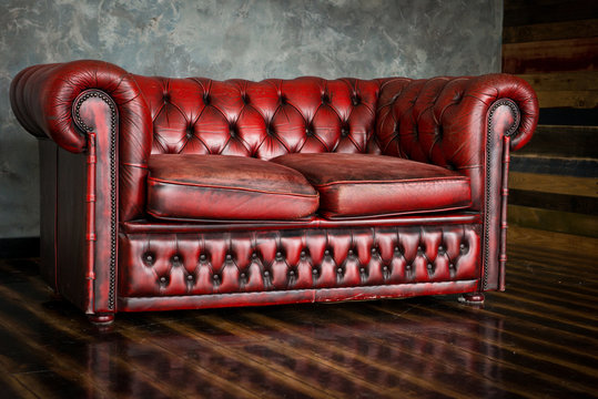 The divan is an honor of burgundy color in the interior.