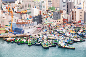Fototapeta na wymiar Amazing top view of ships parked at Busan Harbor