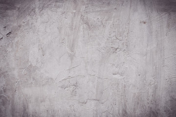 Obraz na płótnie Canvas old grungy texture, wet grey concrete wall. Raw plaster wall background. Asphalt close-up. vintage tone filter