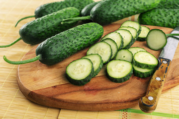 Cucumber on wooden background