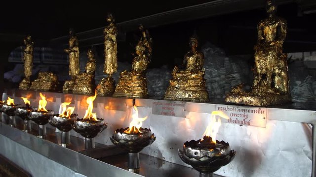 Oil lanterns in temple.