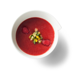 Raspberry panna cotta, isolated on white background, view from above