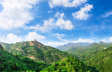 Tower and green mountains of the Great Wall of China