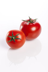fresh tomatoes isolated white.