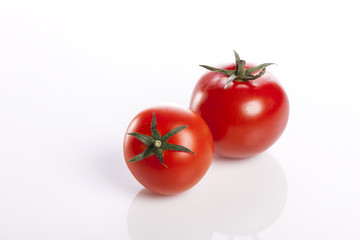 fresh tomatoes isolated white.