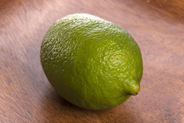 fresh green lime isolated white