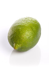 fresh green lime isolated white