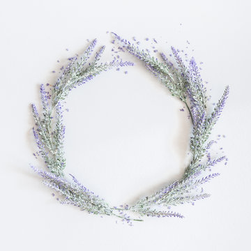 Fototapeta Lavender flowers on pastel gray background. Flat lay, top view, square, square