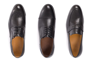 Classic male black leather shoes isolated on a white, top view