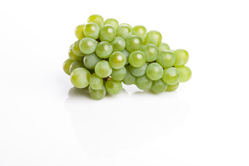 green grapes on the white background.