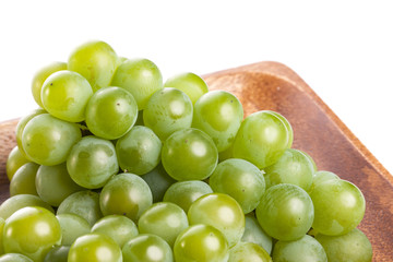 green grapes on the white background.