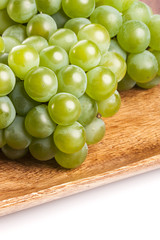 green grapes on the white background.