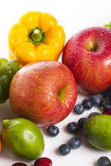many variety fresh fruits on the wood table, grey background.