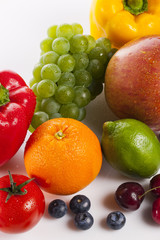 many variety fresh fruits on the wood table, grey background.