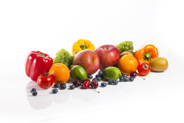 many variety fresh fruits on the wood table, grey background.