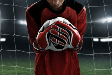Soccer goalkeeper catches the ball