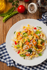 Nasi goreng. Fried rice with egg and vegetables.