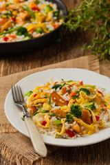 Nasi goreng. Fried rice with egg and vegetables.