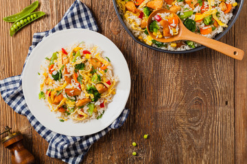 Nasi goreng. Fried rice with egg and vegetables.