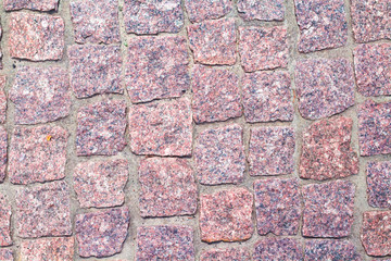 fragment of granite pavers in different color schemes