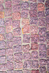 fragment of granite pavers in different color schemes