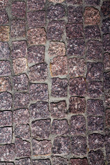 fragment of granite pavers in different color schemes