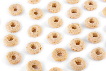 healthy cereal rings on white background. Good morning. A healthy, healthy breakfast. Dry muesli.