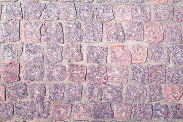 fragment of granite pavers in different color schemes