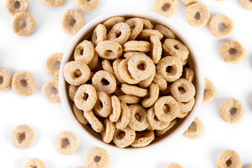 healthy cereal rings on white background. Good morning. A healthy, healthy breakfast. Dry muesli.
