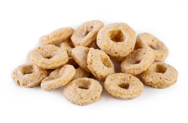 healthy cereal rings on white background. Good morning. A healthy, healthy breakfast. Dry muesli.