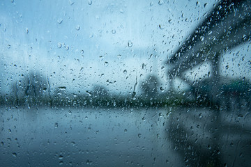 driving in heavy rain especially around vehicles. rain on a car window. 