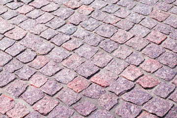 fragment of granite pavers at an angle in different color schemes