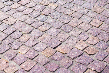 fragment of granite pavers at an angle in different color schemes