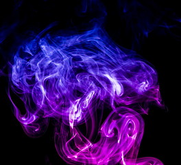 Colored smoke on black background
