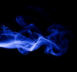 Blue smoke on black background