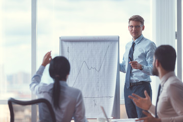 Young business people at a presentation