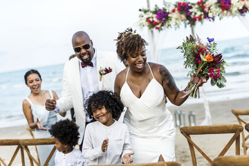 Happy bride and groom in a wedding ceremony at a tropical island