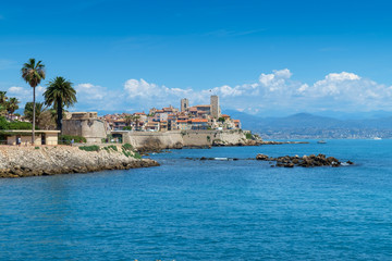 Fototapeta na wymiar The old town of Antibes and defensive stone walls occupying a prominant position on the Mediterranean, French Riviera.