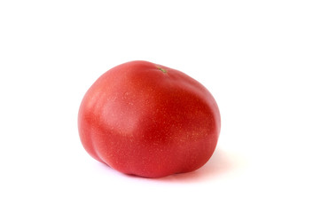 Red tomato close-up on a white background