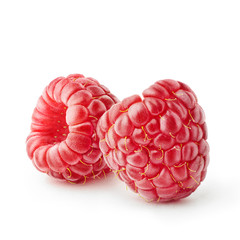 isolated berries. Two fresh raspberries isolated on white background