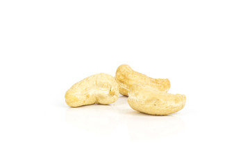 Set of three whole raw cashew nut isolated on white background