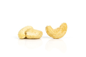 Fototapeta premium Group of three whole raw cashew nut isolated on white background