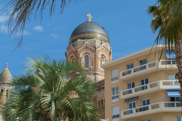 Fototapeta na wymiar The Basilica dominates the skyline of Saint Raphael, on the French Riviera.
